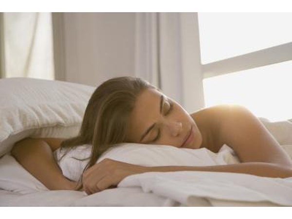 Woman sleeping in bed