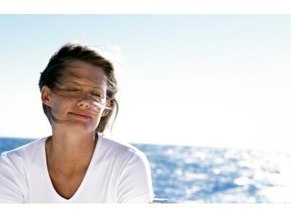 Woman closing eyes resting