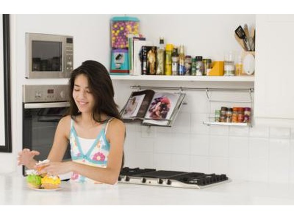 Teenage girl in kitchen