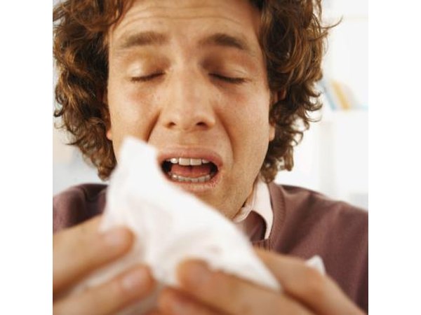 Man about to sneeze
