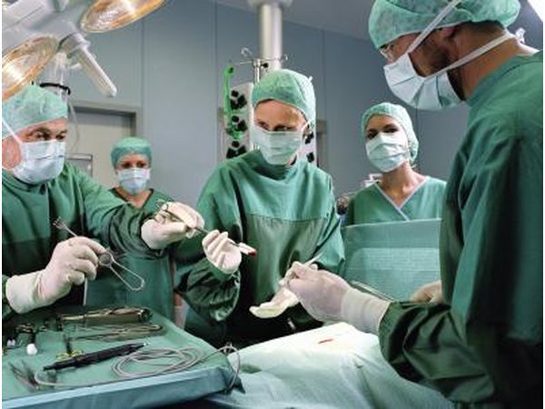 Surgeons operating.