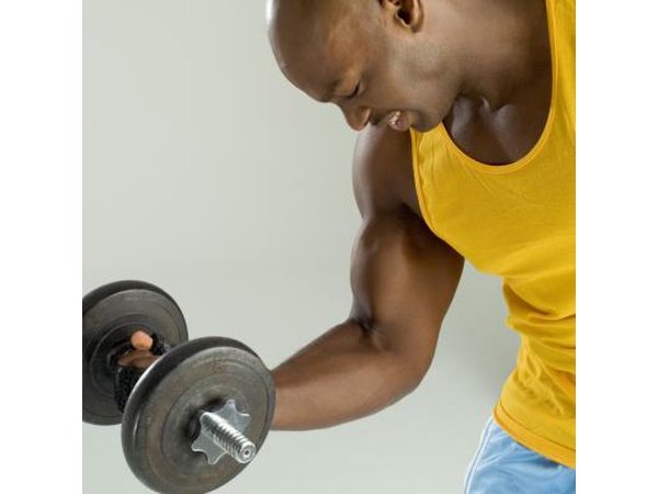 Young man toning his muscles
