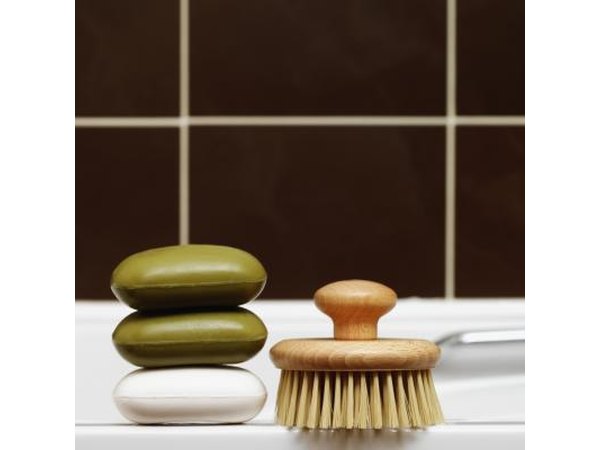 Present special soaps and lotions in a basket with aromatic oils, bath crystals, cologne and high-end shampoos.