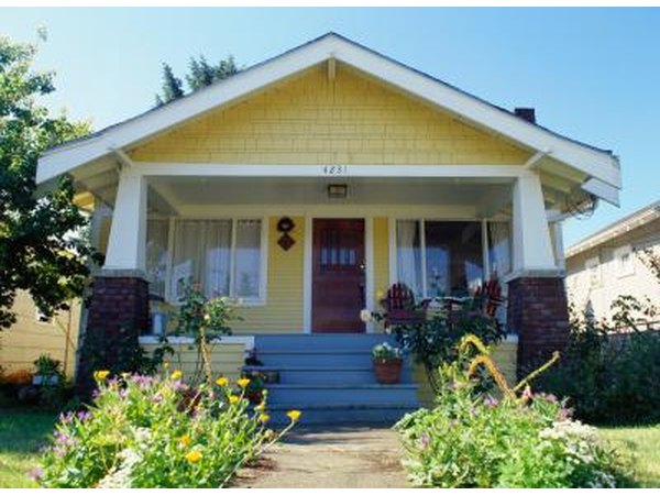 Bright shades of yellow work with a dark gray roof.