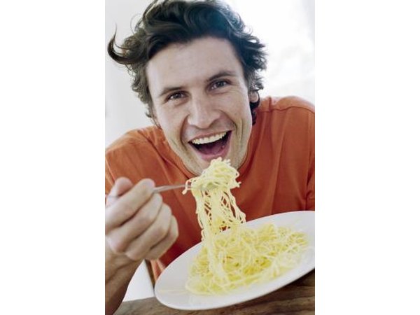 Man eating spaghetti