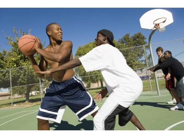 Friends playing basketball