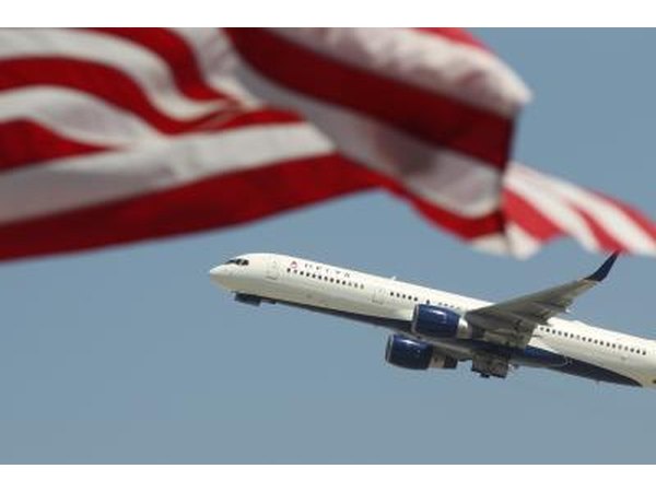 Delta Airlines passing an American flag