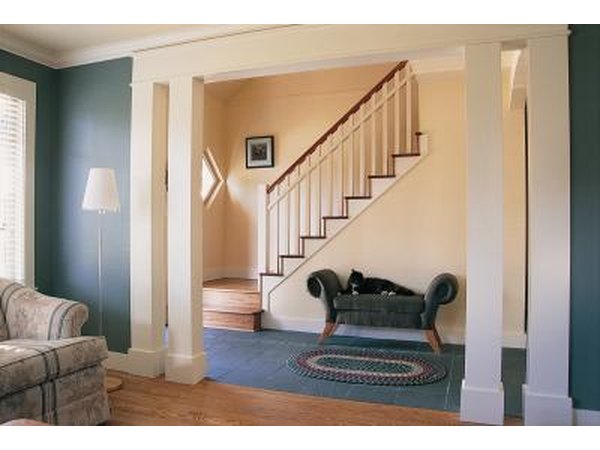 Robin's egg blue prevents the dark wood features of this room from feeling too heavy.