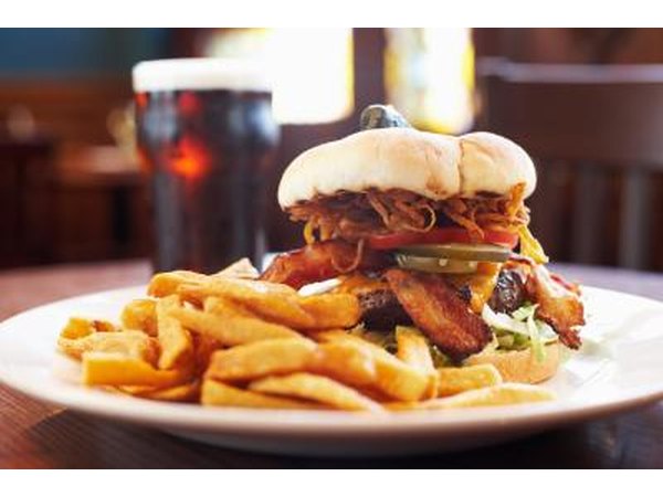 A burger with french fries.