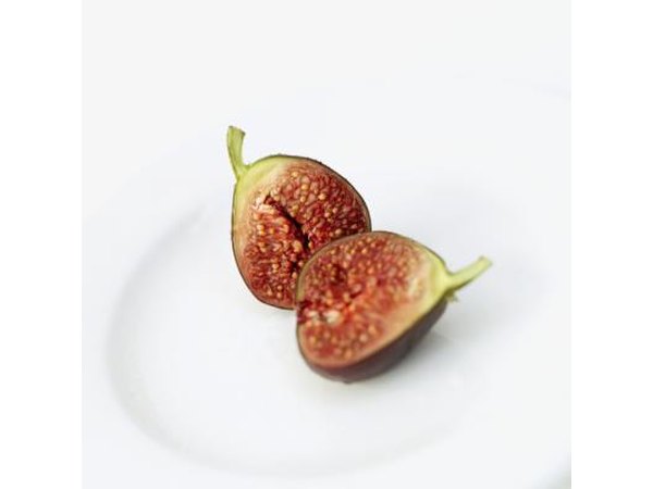 The cross-section of a fig on a plate.