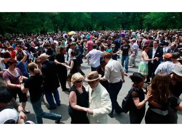 Couples swing dance in honor of legendary Lindy Hop pioneer Frankie Manning