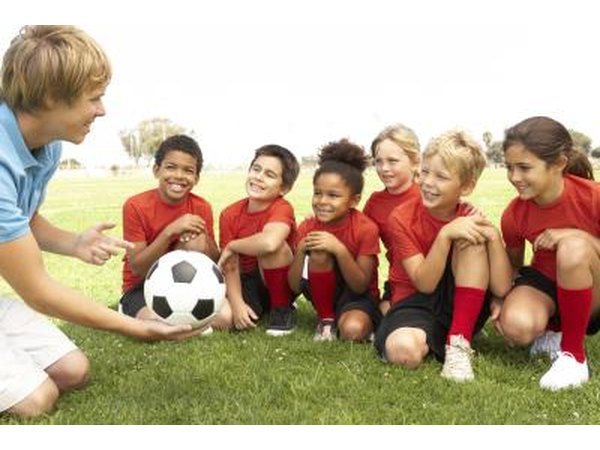 Children laughing with coach