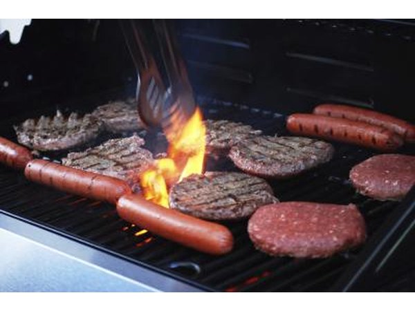 hamburgers and hot dogs on the barbecue