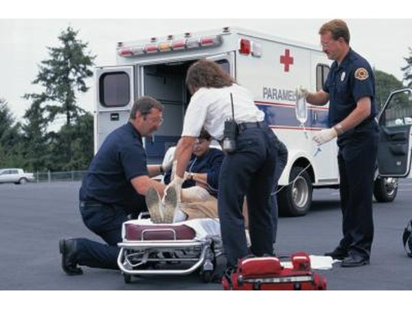 EMT treating a patient on the scene