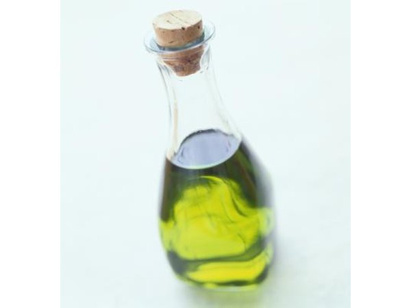 Olive oil in clear jar.