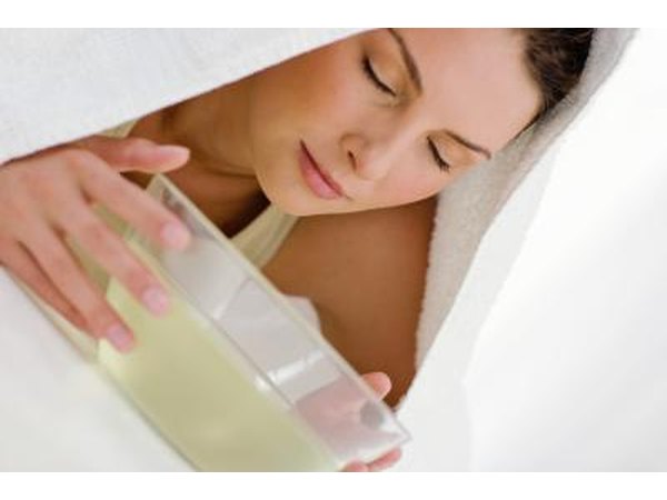 Woman breathing over treatment
