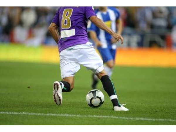 A professional soccer player on a field.