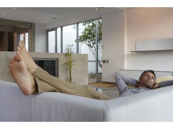 Man resting on couch