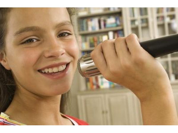 young girl lip syncing