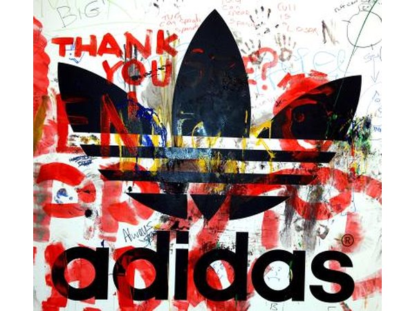 Paint covered adidas logo used in a secret show by The Ting Tings.