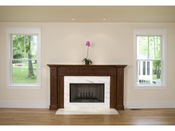 Keep it simple if your fireplace is painted in neutral tones or you just like natural decorative elements
