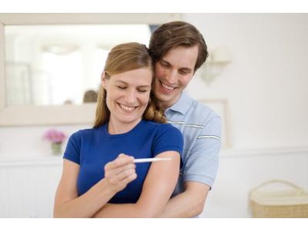 couple reading pregnancy test