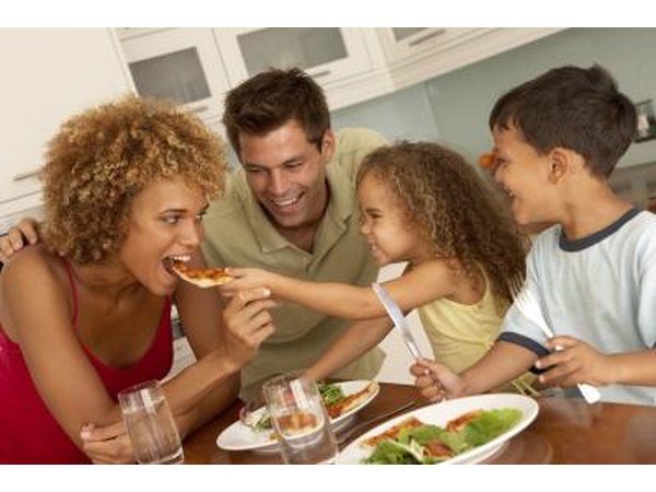 Making pizza is a fun family activity.
