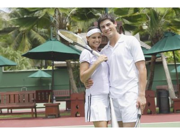 Couple wearing tennis outfits