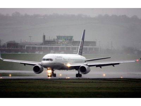 Continental Airliner touching down in the rain