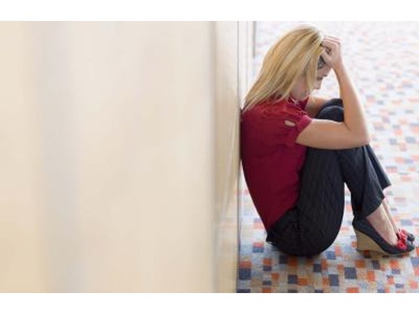 Woman sitting on floor