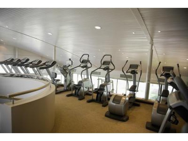 row of elliptical machines in gym