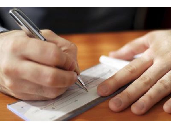 If you are giving the check before the wedding, write it out to either the bride or the groom, depending on who you are closest with.