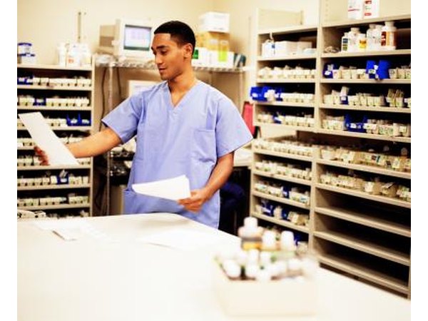 Pharmacist looking at paperwork