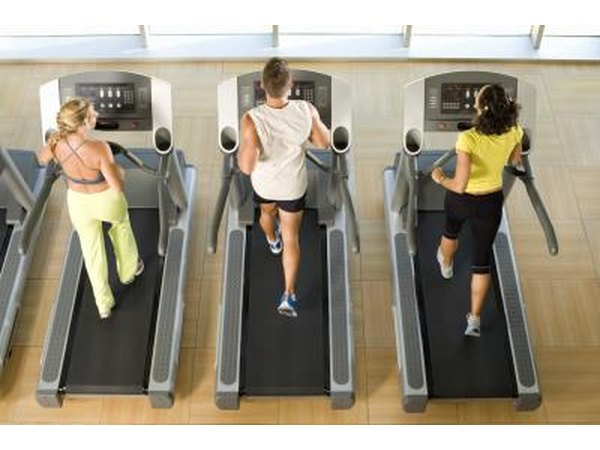 people on treadmills at gym
