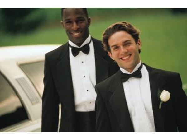 Groomsmen in limousine