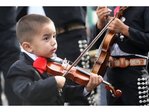Young mariachi's practice before performance