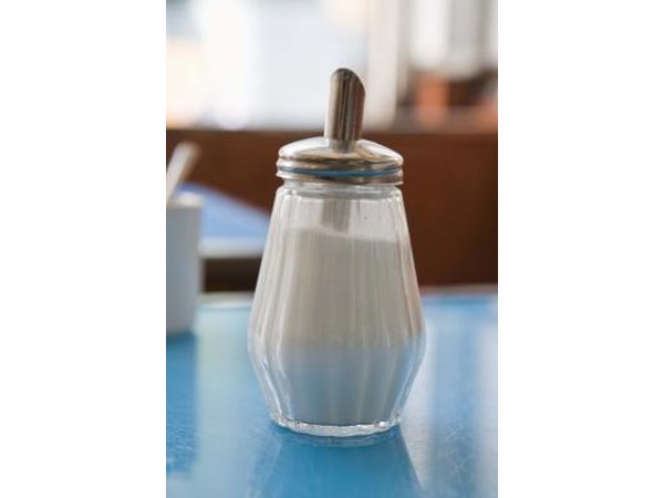 Common table sugar is a primary ingredient in this smoke bomb recipe.
