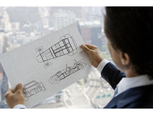 Engineer with design plans
