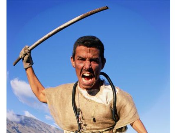 Aggressive man holding metal pipe