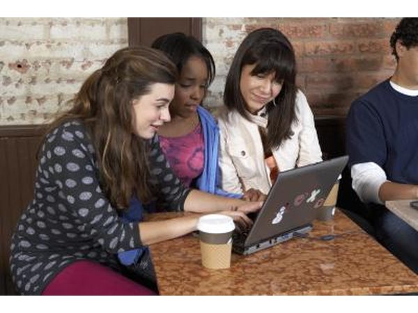 Girls on laptop in coffee shop