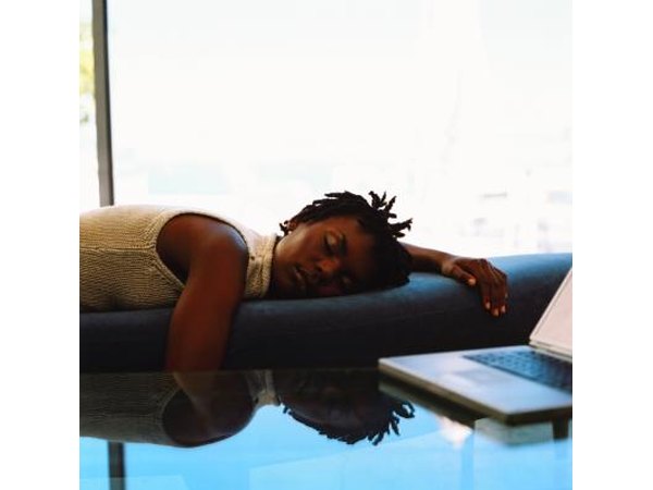 Sleepy woman on couch