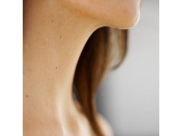 Close-up of woman's neck and throat