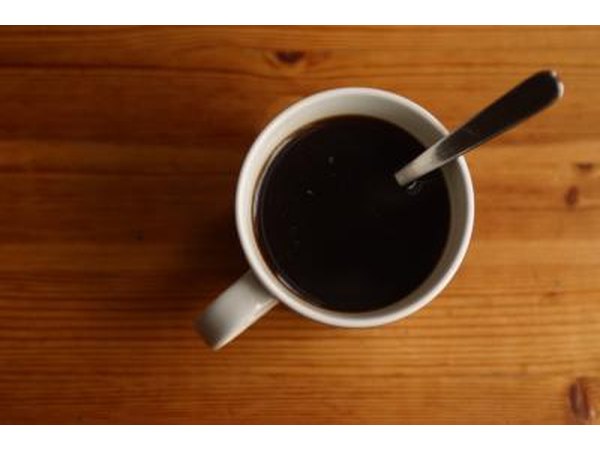 A cup of black coffee.