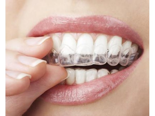 The active ingredient in whitening strips bleaches your teeth to a whiter color.