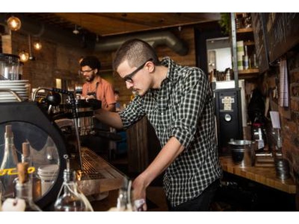 Barista in action making a latte