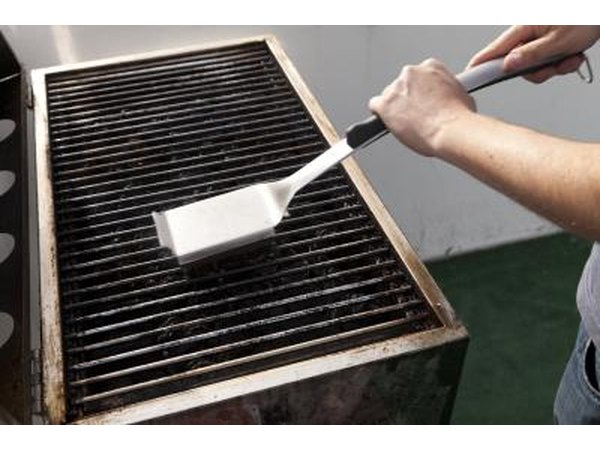 Cleaning grill.
