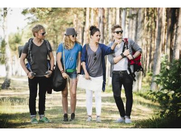 hipsters walking around in park