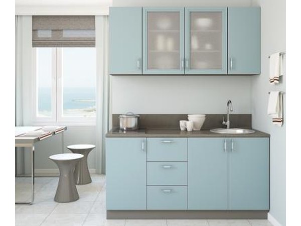 A slate blue, or deep blues with gray undertones work well with oak trim