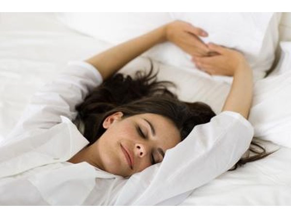tired woman in bed