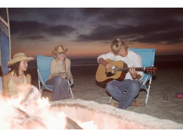 Teens around bonfire
